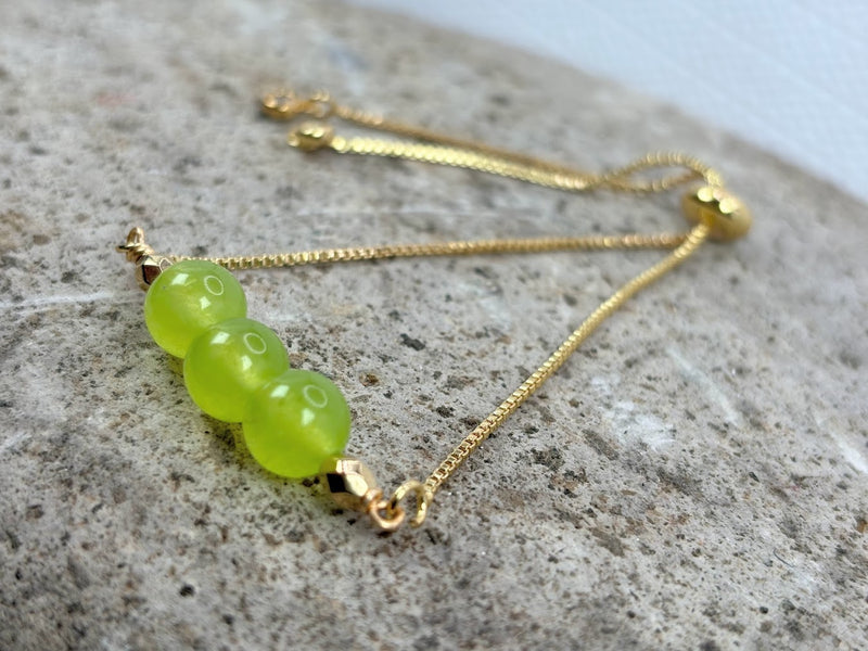 August Adjustable Slider Bracelet with Peridot Crystal  Left