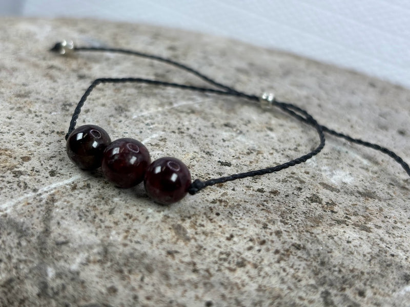 January birthstone crystal adjustable wax cord bracelet with Garnet Left