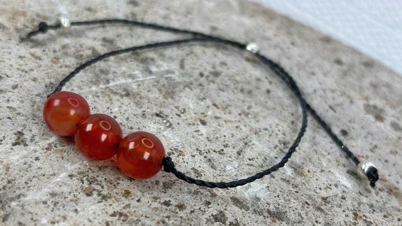 July Birthstone with Adjustable Wax Cord Bracelet with Carnelian Left